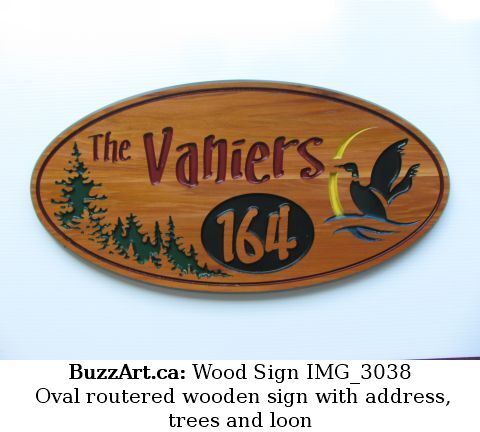 Oval routered wooden sign with address, trees and loon